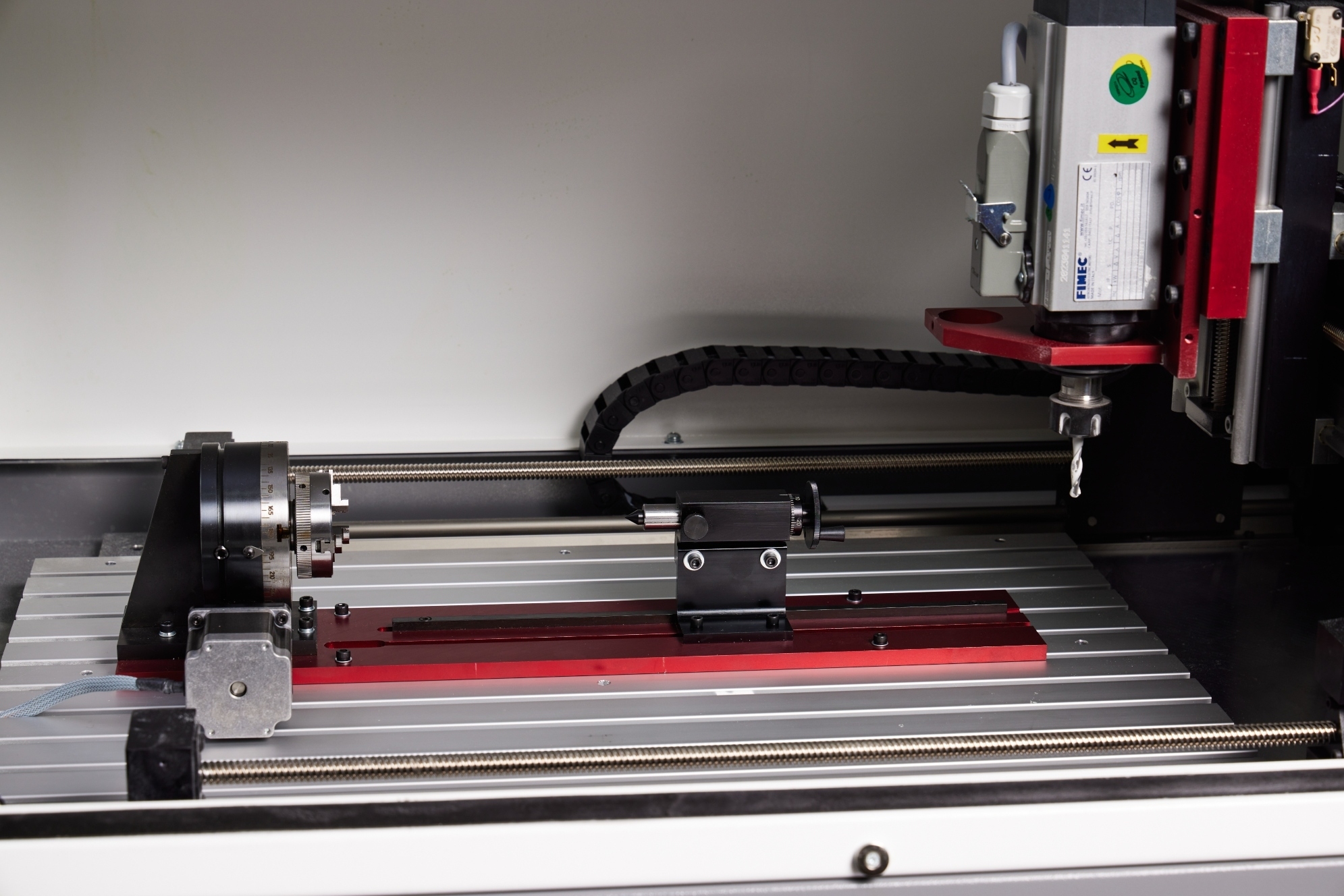 Work holding fixtures mounted side by side on the Router 2600 T-slot table